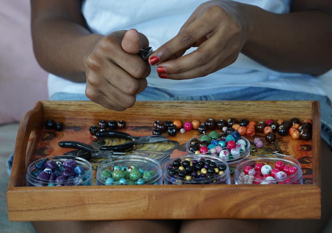 Image of Gabrielle making jewelry